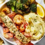 Garlic Butter Lobster and Shrimp Dish Served with Lemon