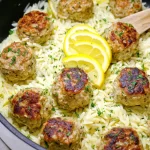 Juicy Greek Chicken Meatballs with Lemon Orzo on a Plate