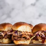 Pulled Pork BBQ Sliders with Coleslaw on Brioche Buns