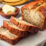 Sliced Easy Moist Banana Bread on a Wooden Board
