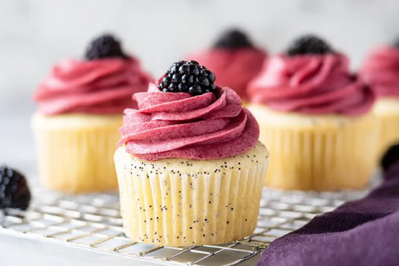 Lemon Poppy Seed Cupcakes with Blackberry Frosting Plated