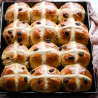 Freshly Baked Traditional Hot Cross Buns with Raisins
