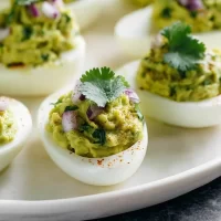 Avocado Deviled Eggs on a Platter - Delicious and Healthy!