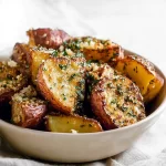 Garlic Parmesan Roasted Potatoes in a Crispy Golden Coat