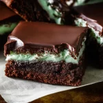 Decadent Mint Chocolate Brownies on a White Plate
