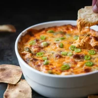 Buffalo Chicken Dip Served in a Cheesy Meltdown