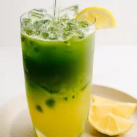 Iced Matcha Lemonade: A Refreshing Summer Delight Iced Matcha Lemonade in a Refreshing Glass with Lemon Slices