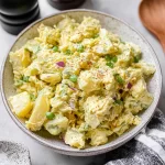 Delicious Potato Salad Garnished with Fresh Herbs