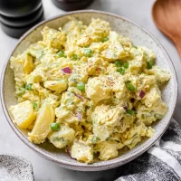 Delicious Potato Salad Garnished with Fresh Herbs