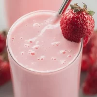 Strawberry Smoothie Bliss: Your Perfect Summer Treat Refreshing Strawberry Smoothie in a Glass