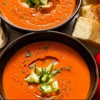 Chilled Gazpacho Soup: Refresh Your Summer Meals Today! Chilled Gazpacho Soup in a Bowl with Fresh Herbs