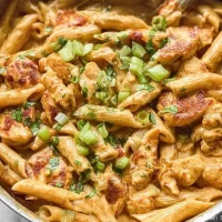 Creamy Cajun Pasta Served with Garnish