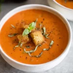 Creamy Tomato Basil Soup in a Rustic Bowl