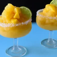 Frozen Mango Margarita Slushie: Refreshing and Irresistible! Frozen Mango Margarita Slushie - Refreshing Summer Drink