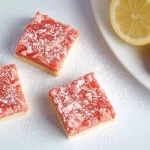 Strawberry Lemonade Bars Served on a Bright Dish