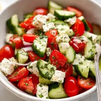 Tomato Cucumber Feta Salad: A Refreshing Summer Delight Tomato Cucumber Feta Salad in a Bowl