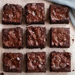 Decadent Chocolate Brownies on a Wooden Table