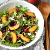 Peach Pecan Salad: A Delightful Summer Treat Delicious Peach Pecan Salad on a White Plate