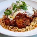 Golden Brown Chicken Parmesan with Marinara Sauce