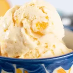 Homemade Peach Ice Cream in a Bowl