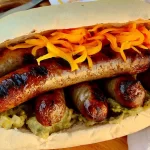 Smoky Grilled Sausages on Charcoal Grill