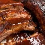 Delicious Sticky Homemade BBQ Ribs on a Serving Platter