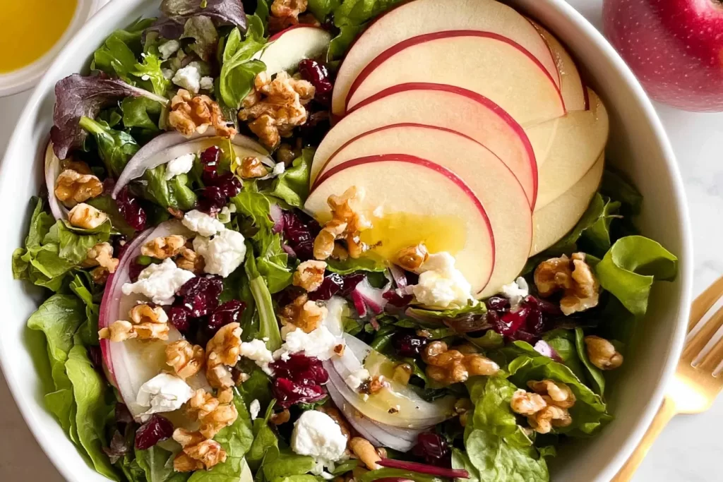 Fresh Apple Walnut Salad Ingredients on a Wooden Table
