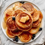 Buttermilk Pancakes Stacked High on a Plate