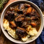 Cider Braised Short Ribs Plated with Garnish