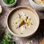 Creamy Wild Mushroom Soup in a Rustic Bowl