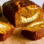Slice of Pumpkin Cream Cheese Bread with Toppings