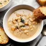 Delicious Roasted Garlic White Bean Soup in a Bowl